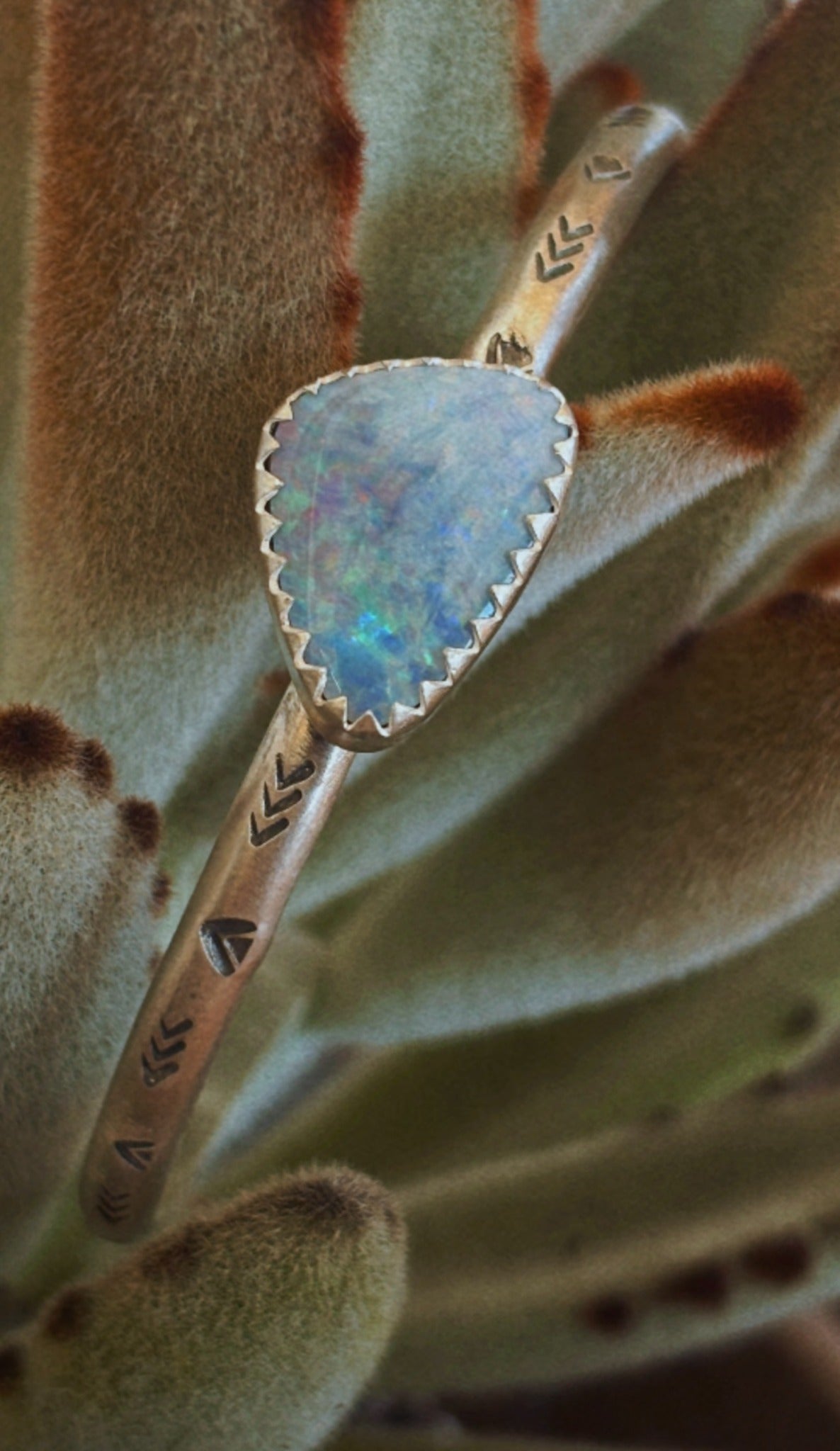 Handmade silver opal cuff on cactus